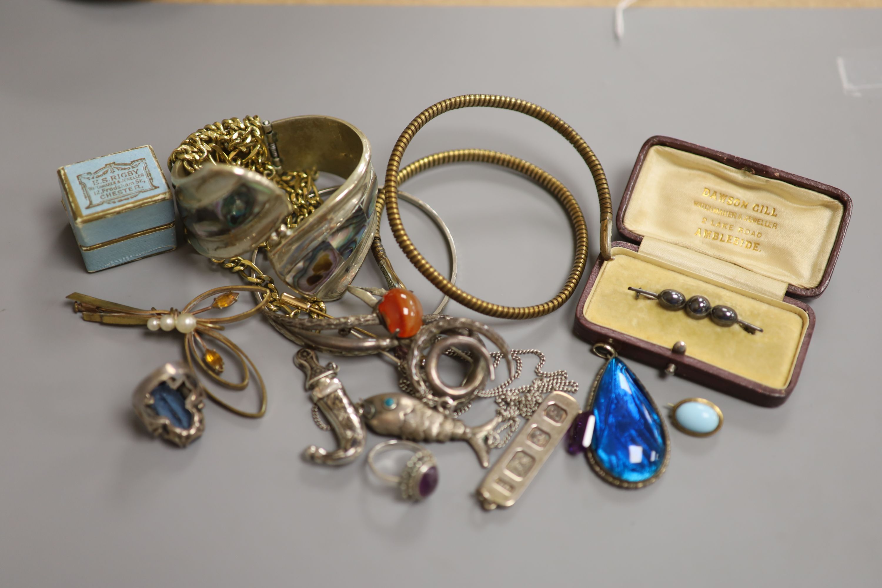 Assorted jewellery including silver pendant and costume.